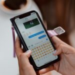 close up shot of a person sending text message