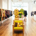interior of stylish boutique with colorful clothes