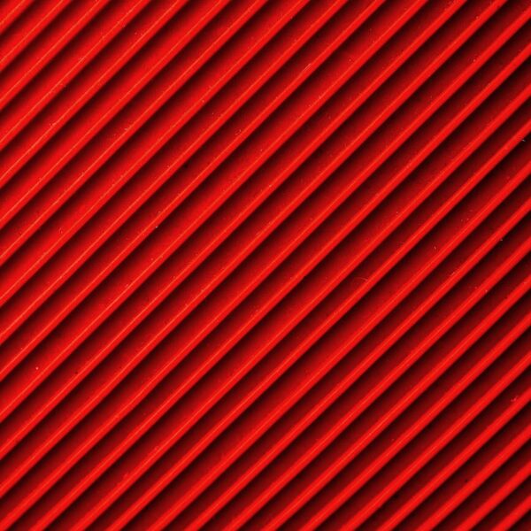 close up photo of red textile