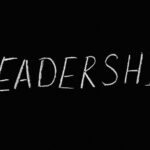 leadership lettering text on black background