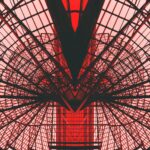 low angle photography of red metal tower