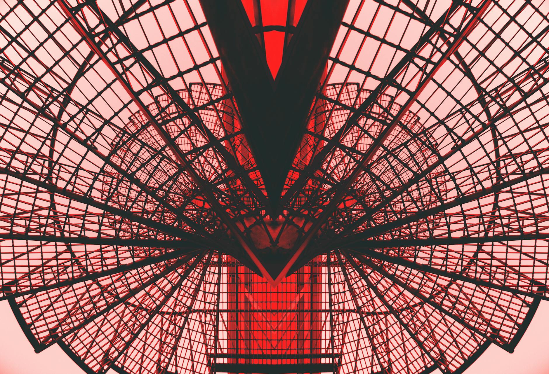 low angle photography of red metal tower