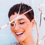 smiling woman in short hair with a beautiful smile