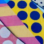 red blue and yellow heart shaped textile