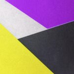 yellow black and purple colored papers