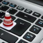 white caution cone on keyboard