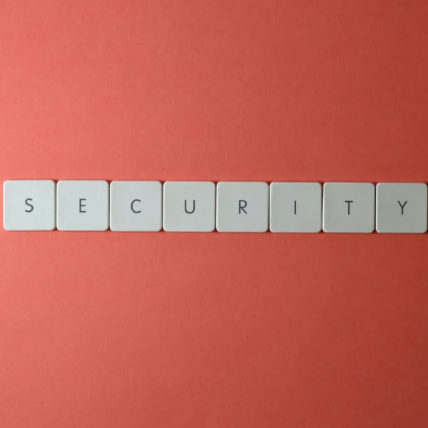 close up shot of keys on a red surface