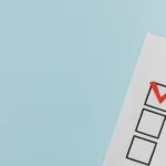 red check mark on box in close up view