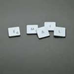 email blocks on gray surface