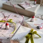 beautifully wrapped christmas gifts with santa decorations