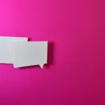 two white message balloons