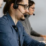 a man talking using headphones
