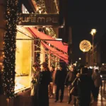 people walking on the street at night