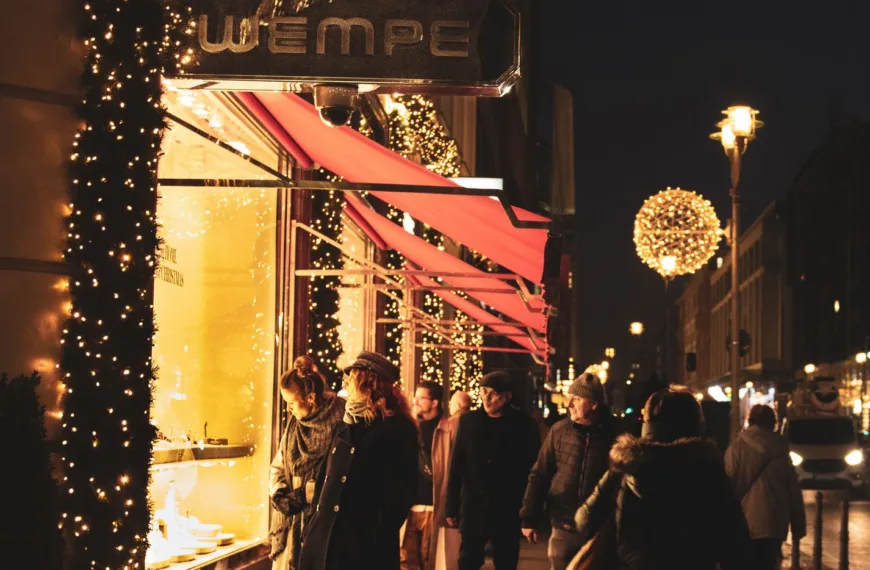people walking on the street at night