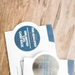 white and blue round plastic container